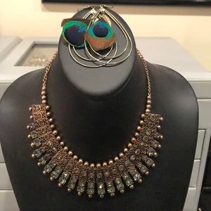 Gold necklace and earring set.